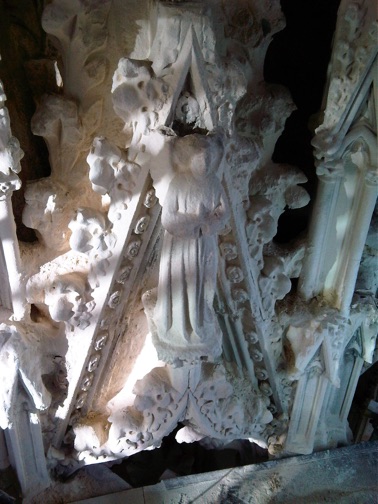 Multiple carved Portland stone crockets and tall, narrow gable. Stone carver, Gary Churchman.